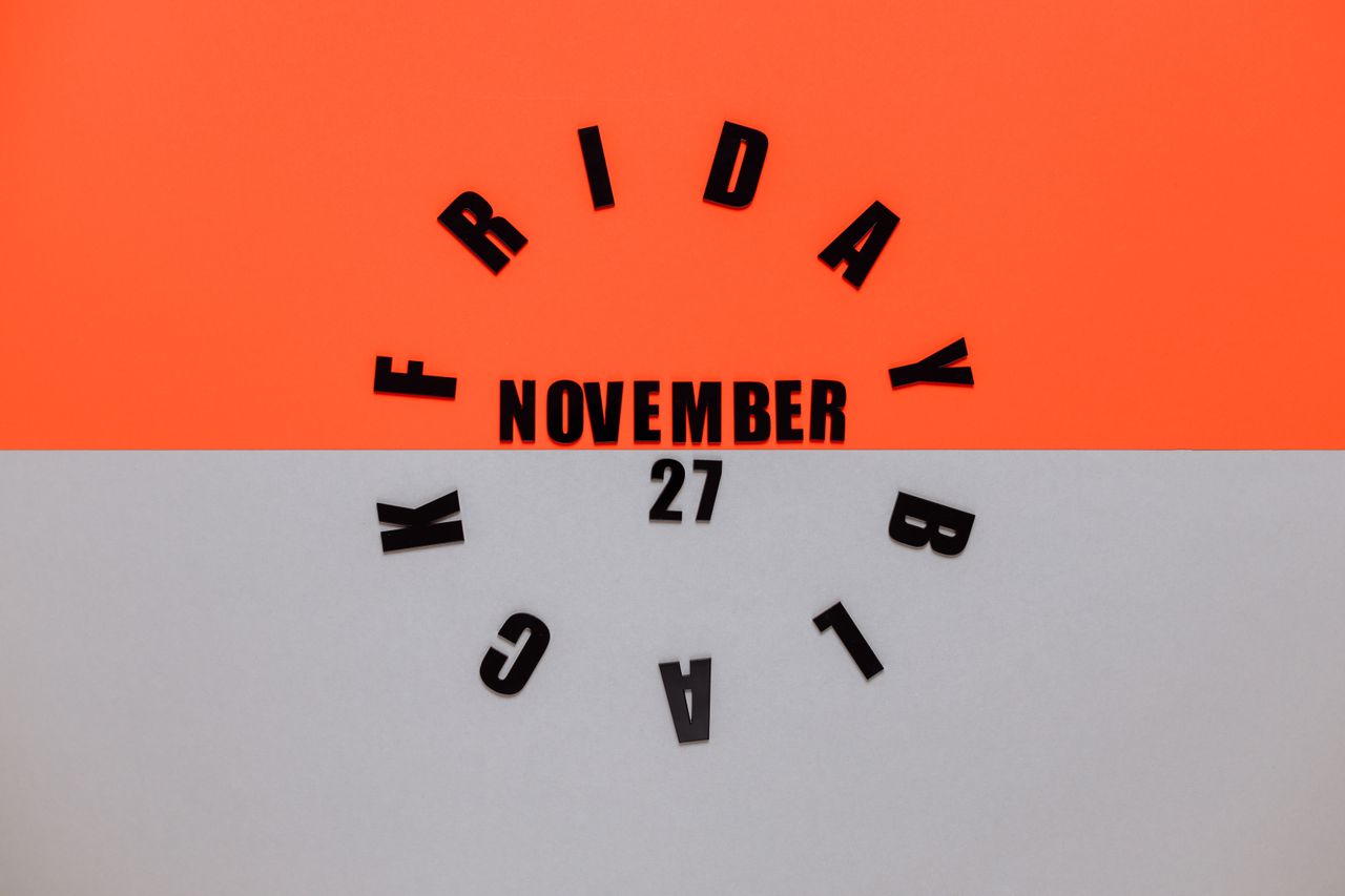 Stylish Black Friday letters arranged creatively on a vibrant background.